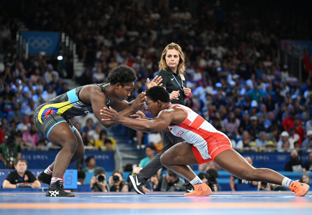 包含哥伦比亚运动员勇夺摔跤比赛冠军的词条 包含哥伦比亚运动员勇夺摔跤比赛冠军的词条